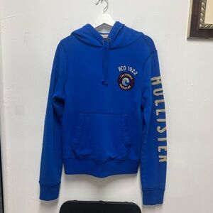 Hollister Royal Blue Crewneck Hoodie with Gold Sleeve Logo